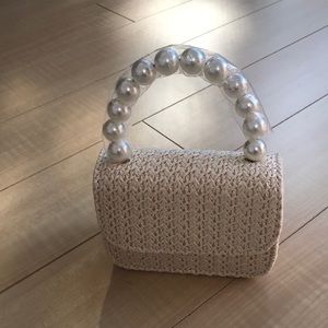 A brand new. A cute mini bag.